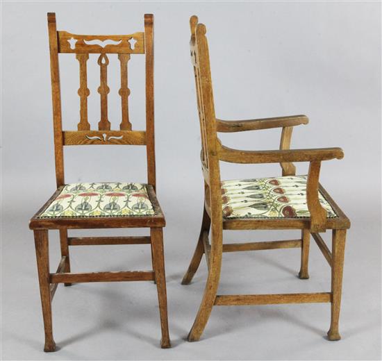 A set of eight Arts & Crafts oak dining chairs, H.3ft 5in.